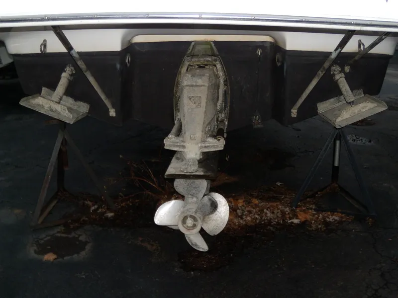 Slide: The Image of 2008 Regal Commodore 2665 boat stern with propeller and support stands. - 3