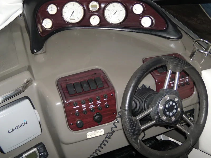 Slide: The Image of 2008 Regal Commodore 2665 dashboard with steering wheel and control panel. - 9
