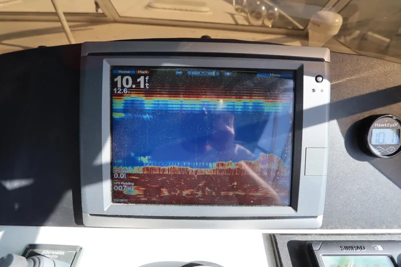 Slide: The Image of Fishfinder display on 2002 Mainship Pilot 34 boat, showing depth and underwater details. - 28