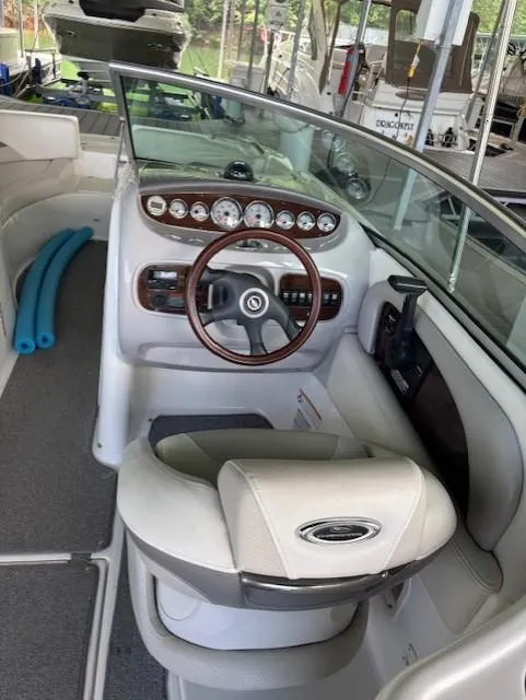 Slide: The Image of 2007 Chaparral Sunesta 274 boat interior with steering wheel and dashboard. - 16