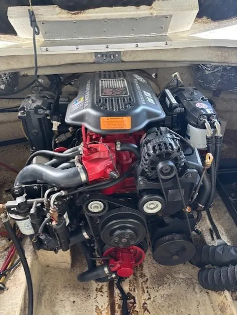 Slide: The Image of 2007 Chaparral Sunesta 274 engine compartment with visible components and wiring. - 19