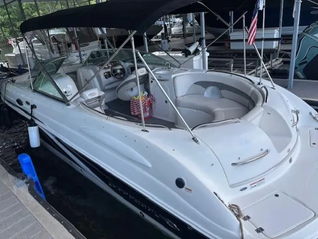 Slide: The Image of 2007 Chaparral Sunesta 274 boat with canopy docked in marina. - 8