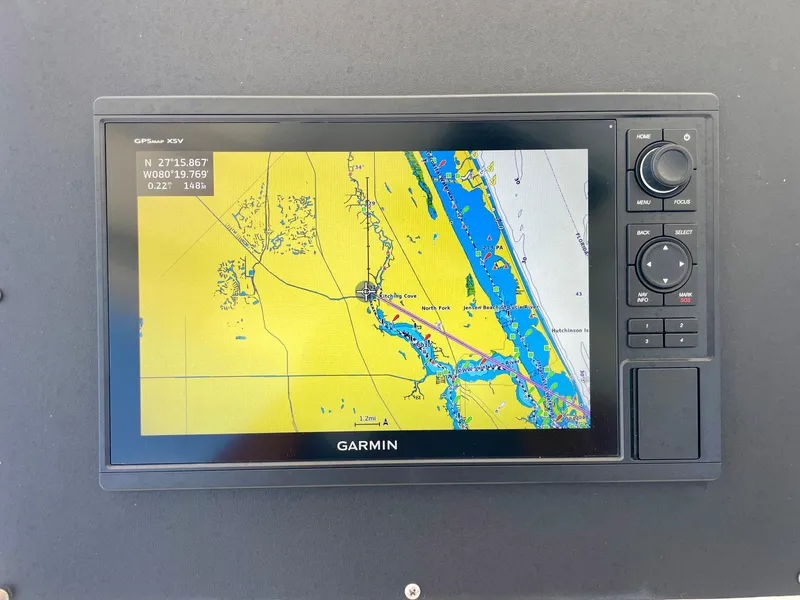 Slide: The Image of Garmin GPS display on 1988 Bertram 43 Convertible boat, showing nautical map. - 15