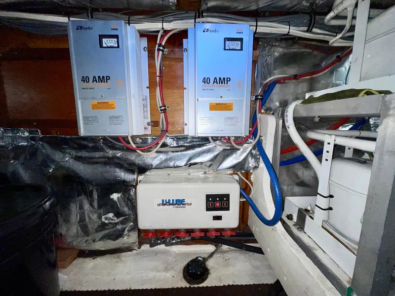 Slide: The Image of Electrical system in a 1988 Bertram 43 Convertible boat engine room. - 36