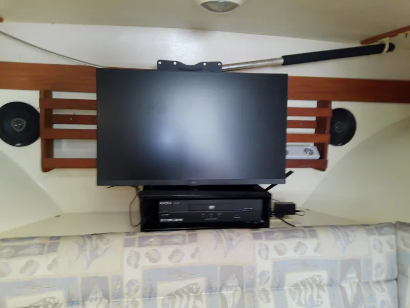 Slide: The Image of Interior of 1996 Albin 31 Tournament Express with TV and audio system. - 42