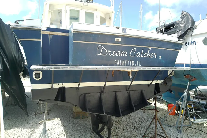 Slide: The Image of 1996 Albin 31 Tournament Express boat named "Dream Catcher" in Palmetto, FL, on dry dock. - 67