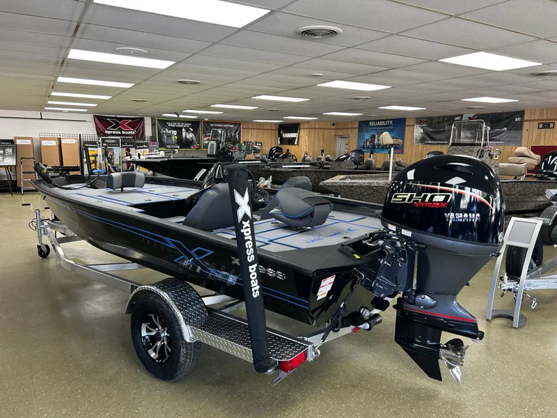 The Image of 2025 Xpress H17 boat in showroom, featuring sleek design and powerful engine. - 1