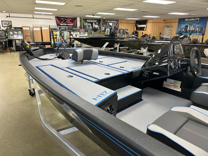 Slide: The Image of 2025 Xpress H17 boat in showroom, featuring sleek design and modern interior. - 3