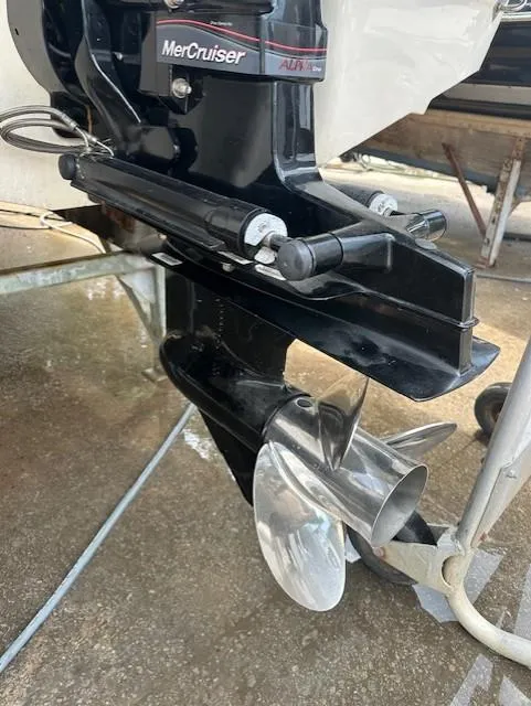 Slide: The Image of 2011 Chaparral 216 SSi boat with MerCruiser outboard motor and propeller. - 4