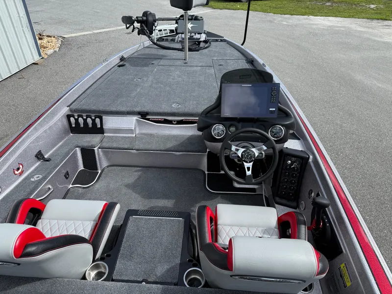 Slide: The Image of 2026 Phoenix 721 ZXL boat interior with modern dashboard and seating. - 10