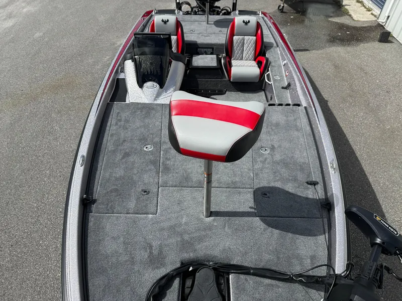 Slide: The Image of 2026 Phoenix 721 ZXL boat interior with red and gray seating, spacious deck, and modern design. - 5