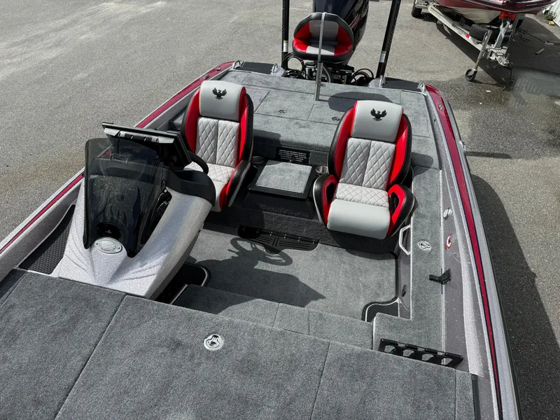 Slide: The Image of 2026 Phoenix 721 ZXL boat interior with red and gray seats, sleek design. - 8