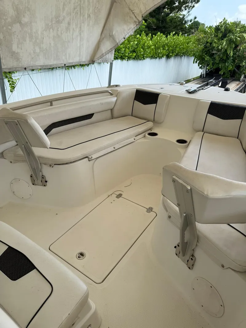 Slide: The Image of 2020 Wellcraft 222 Fisherman boat interior with spacious seating and storage. - 12