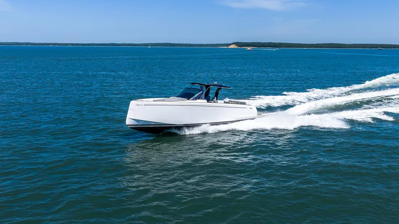 Slide: The Image of 2023 Pardo Yachts P38 cruising on open blue water under clear skies. - 1