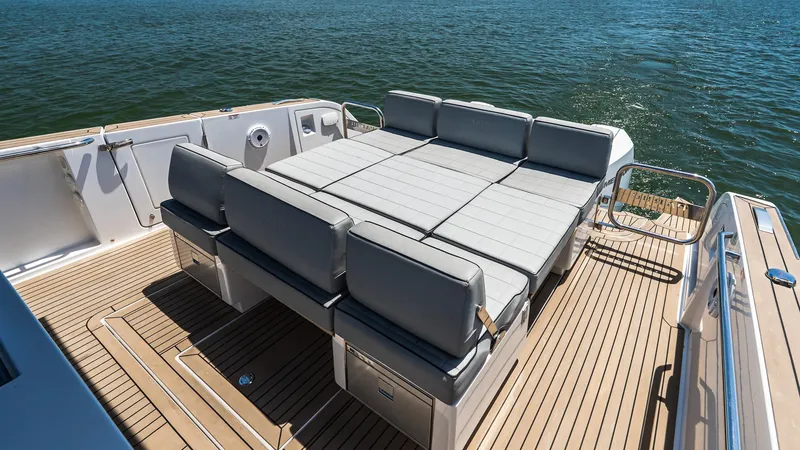 Slide: The Image of Luxurious seating area on 2023 Pardo Yachts P38, overlooking serene waters. - 14