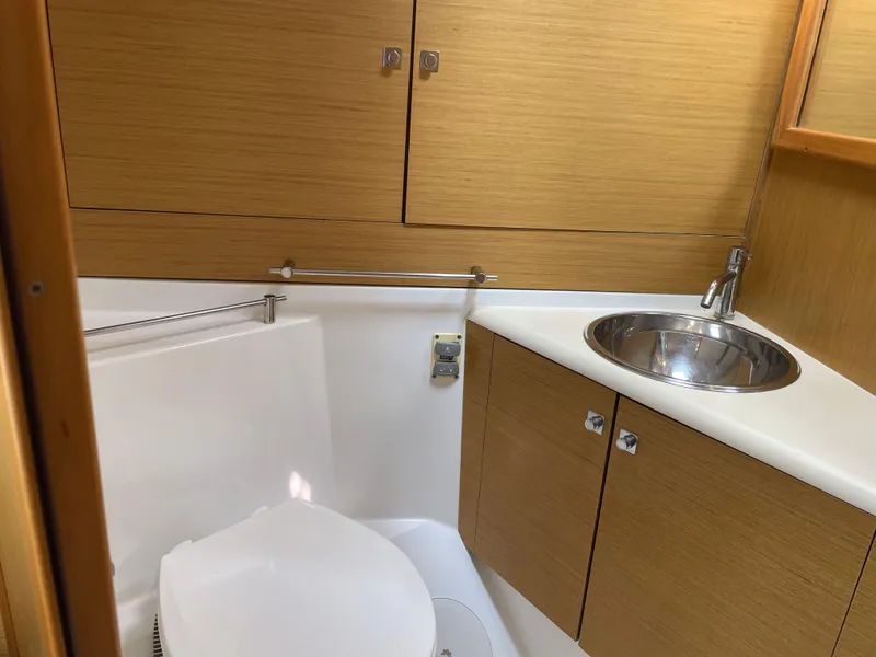 Slide: The Image of Bathroom interior of 2008 Jeanneau Sun Odyssey 45 DS yacht, featuring sink and toilet. - 43
