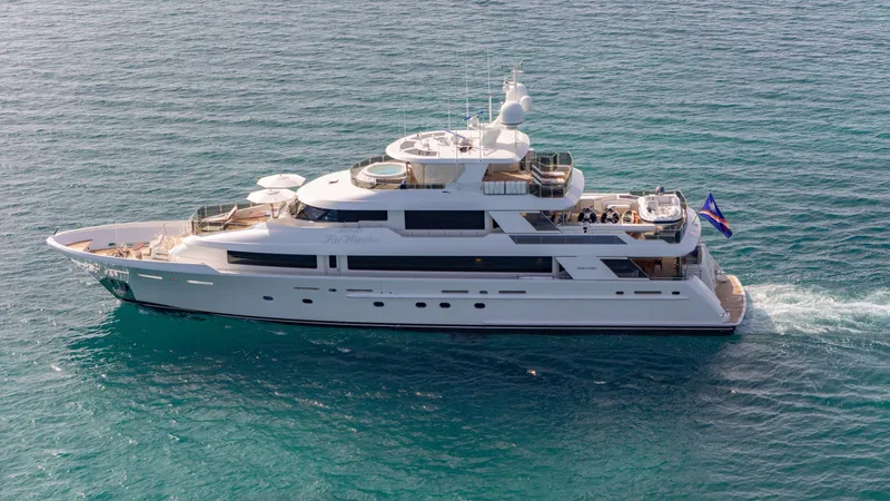 Slide: The Image of Luxurious 2014 Westport 40M yacht cruising on clear blue ocean waters. - 10