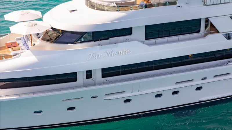 Slide: The Image of Luxurious 2014 Westport 40M yacht cruising on turquoise waters. - 17