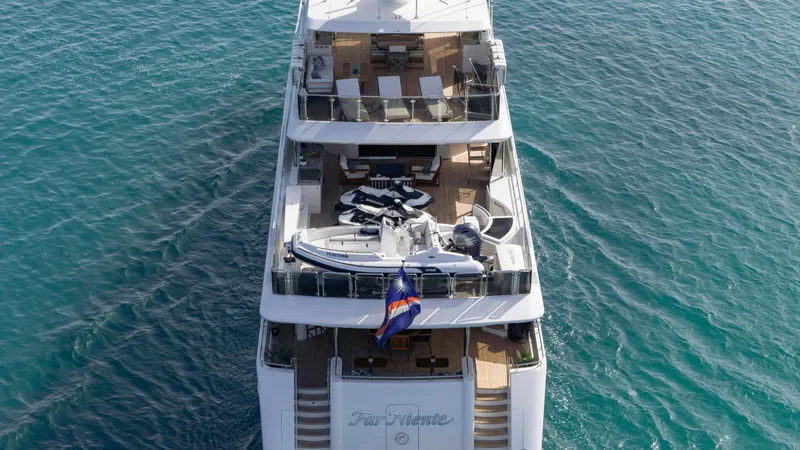 Slide: The Image of Luxury Westport 40M yacht from 2014, aerial view over turquoise water. - 21