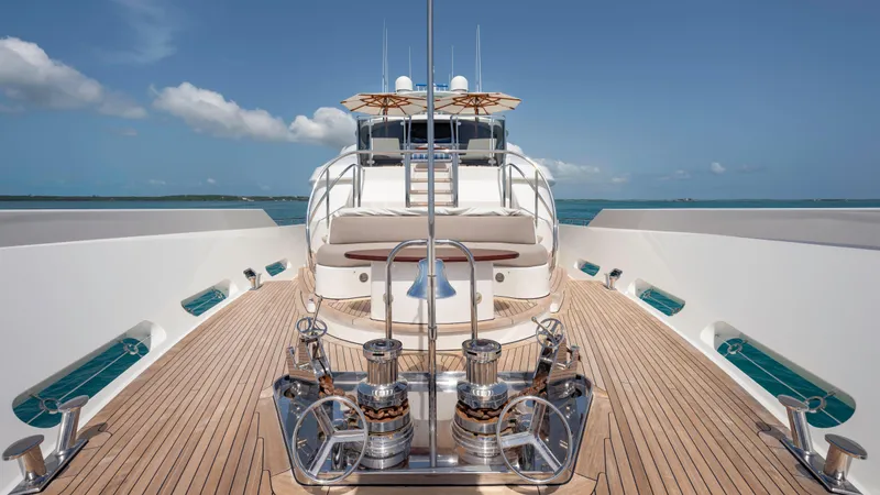 Slide: The Image of Luxurious 2014 Westport 40M yacht deck with clear blue sky and ocean view. - 23