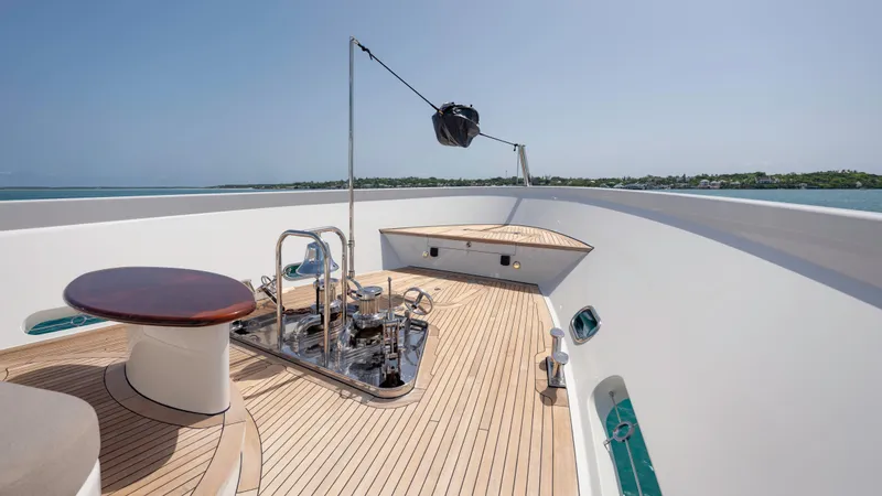 Slide: The Image of Deck view of 2014 Westport 40M yacht with sleek design and ocean backdrop. - 25