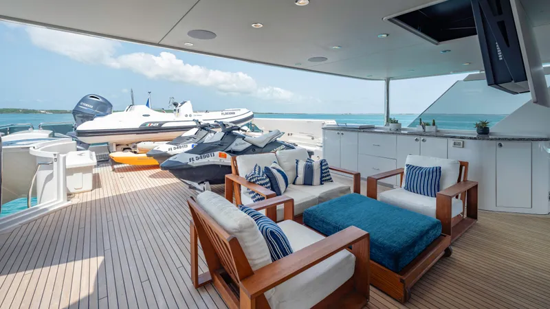 Slide: The Image of Luxurious deck of 2014 Westport 40M yacht with seating and watercraft. - 41