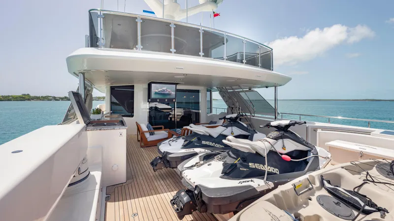 Slide: The Image of Luxurious 2014 Westport 40M yacht deck with jet skis and ocean view. - 47