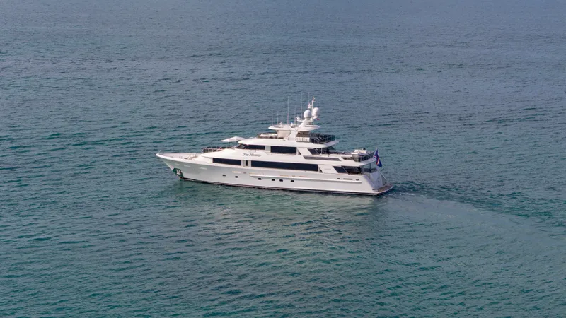 Slide: The Image of Luxury 2014 Westport 40M yacht cruising on calm blue waters. - 8