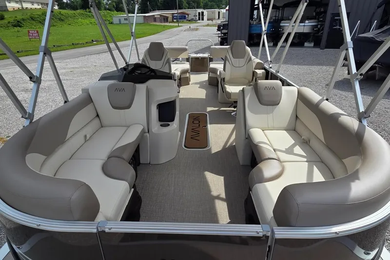 Slide: The Image of 2025 Avalon Platinum LSZ 2385 Cruise Rear Bench pontoon boat with luxurious seating and spacious layout. - 4