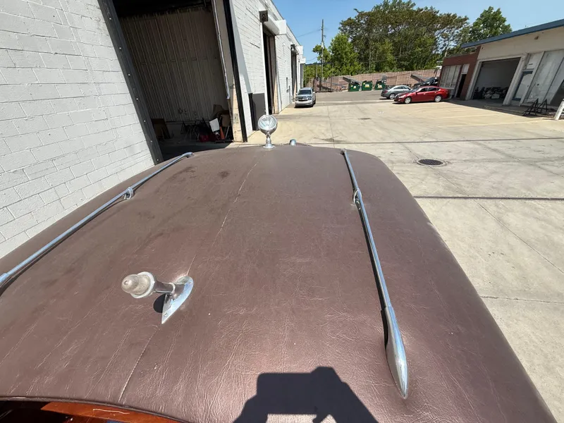 Slide: The Image of 1950 Chris-Craft 22' Custom Sedan roof view, showcasing vintage design and chrome details. - 12