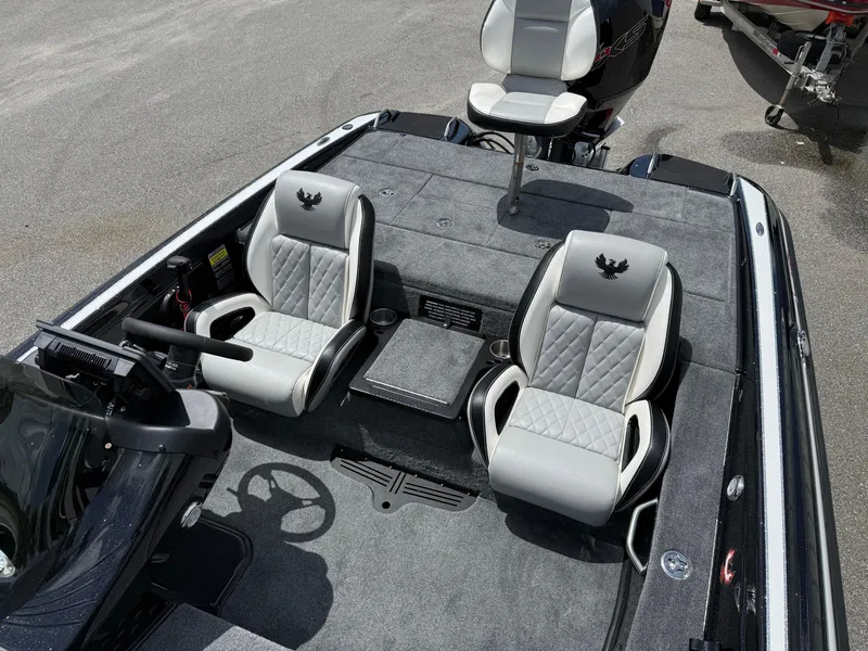 Slide: The Image of 2026 Phoenix 819 ZXL boat interior with three seats and steering wheel, featuring modern design. - 7