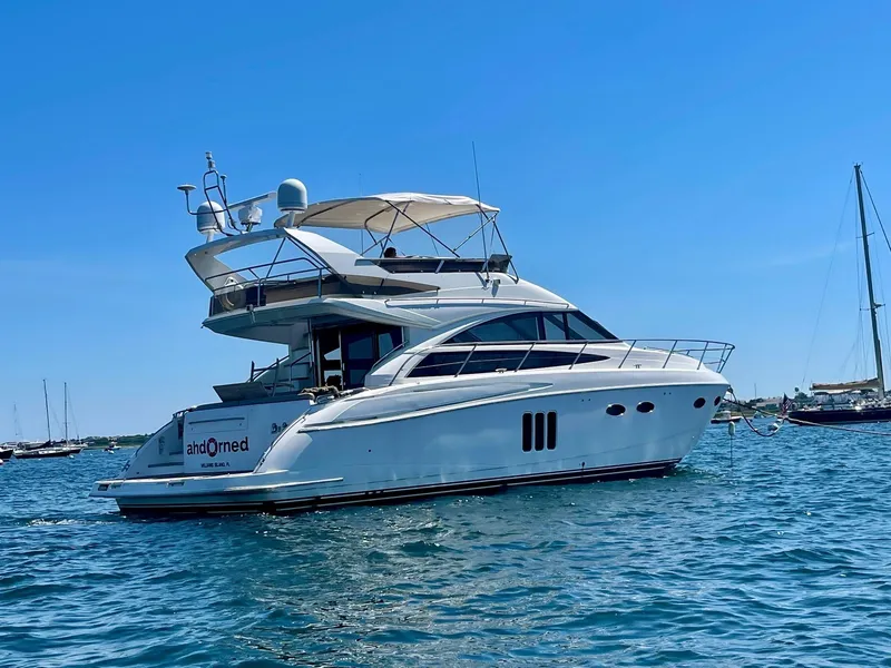 Slide: The Image of Luxury Princess F54 yacht from 2009 on calm blue waters. - 1