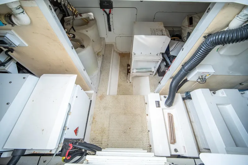 Slide: The Image of Engine room of 2009 Princess F54 yacht with mechanical equipment and wiring. - 103