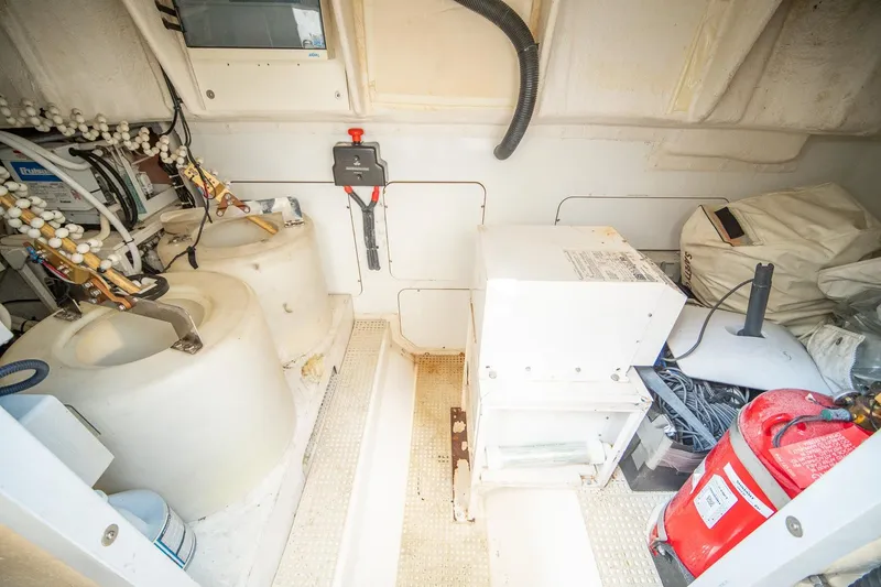 Slide: The Image of Engine room of 2009 Princess F54 yacht with equipment and storage. - 105