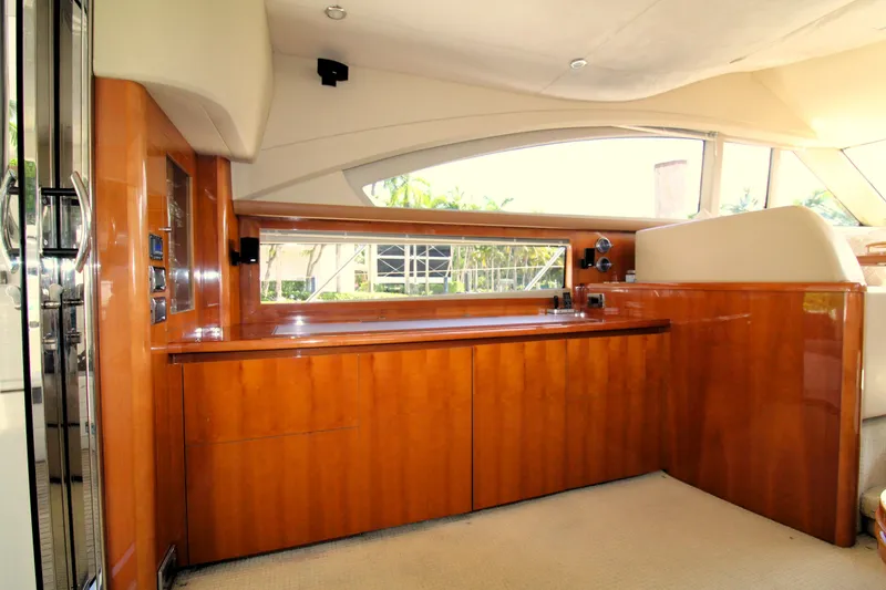 Slide: The Image of Luxurious interior of 2009 Princess F54 yacht with sleek wooden cabinetry. - 11