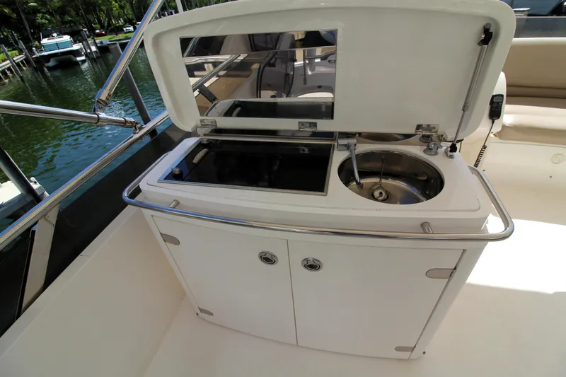 Slide: The Image of Outdoor kitchenette on a 2009 Princess F54 yacht with sink and storage. - 36