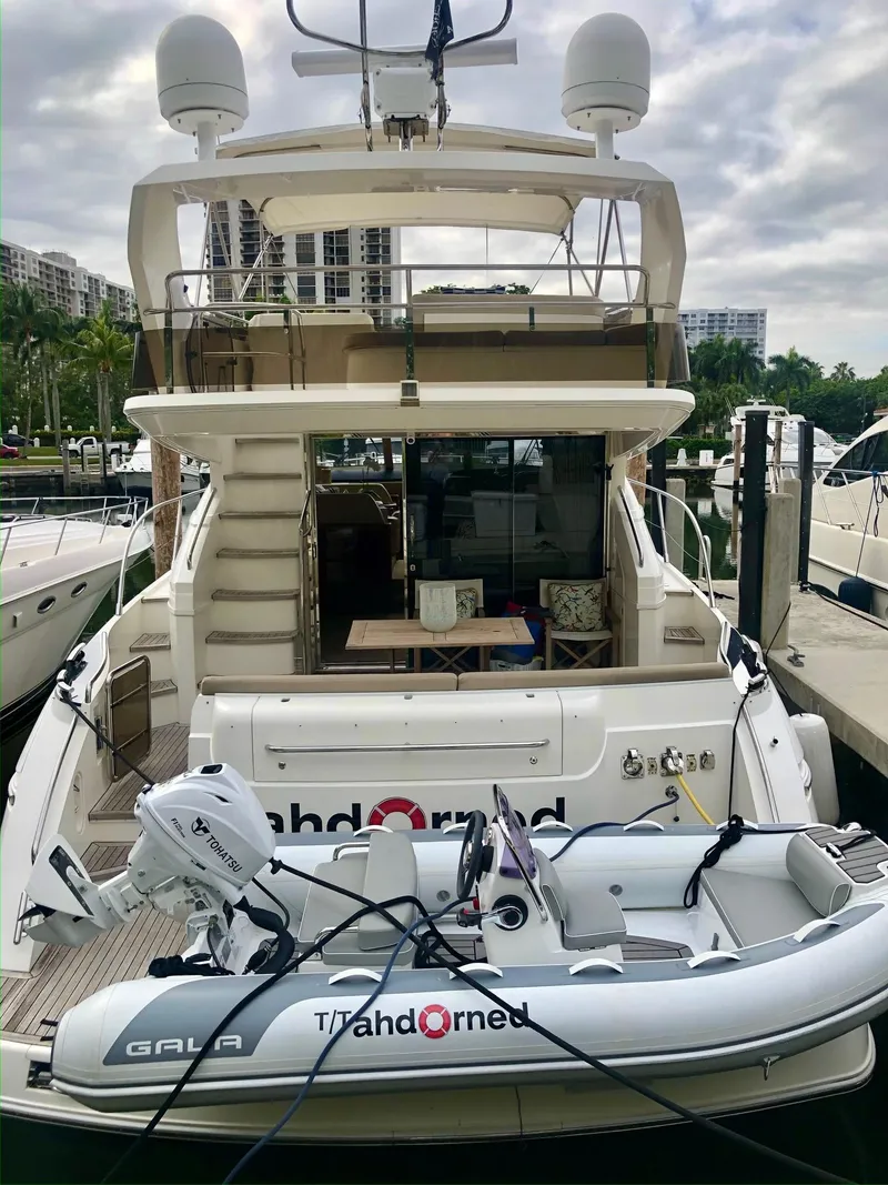 Slide: The Image of Luxury Princess F54 yacht docked with inflatable boat, 2009 model. - 42