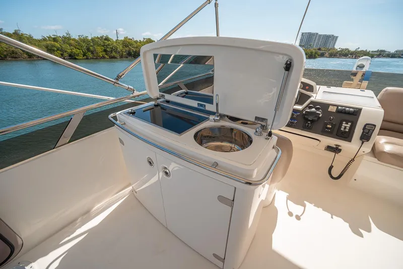 Slide: The Image of Luxury yacht Princess F54, 2009 model, featuring an outdoor sink and control panel. - 51