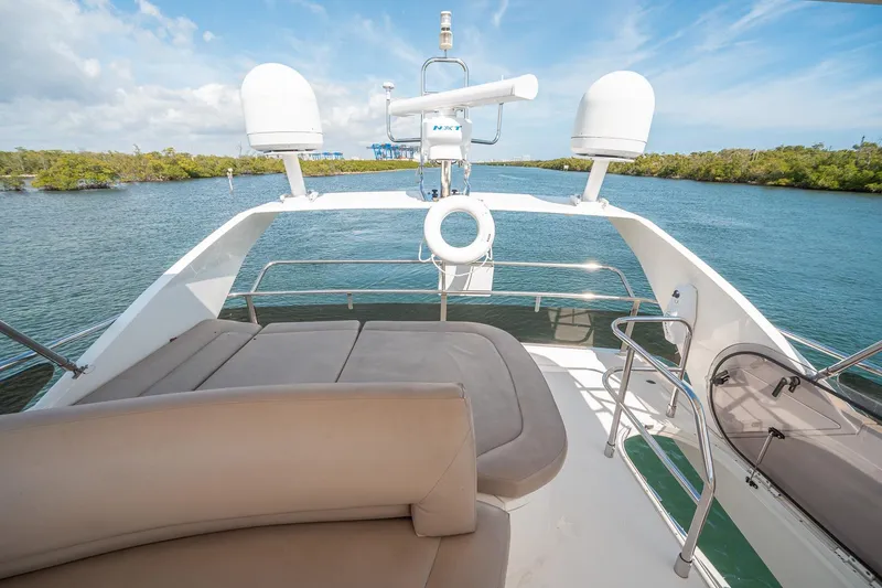 Slide: The Image of Luxurious 2009 Princess F54 yacht deck with scenic waterway view. - 58