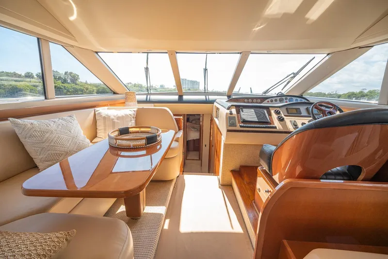 Slide: The Image of Luxurious 2009 Princess F54 yacht interior with elegant seating and modern helm. - 65