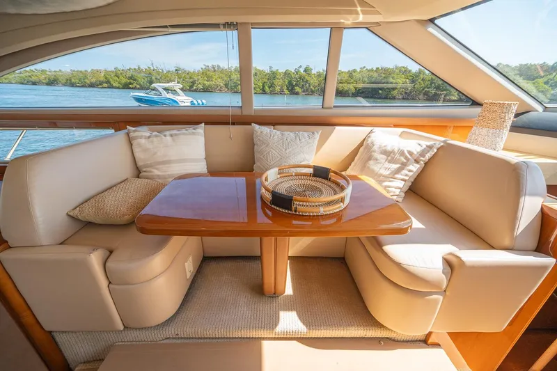 Slide: The Image of Luxurious interior of 2009 Princess F54 yacht with elegant seating and scenic water view. - 66