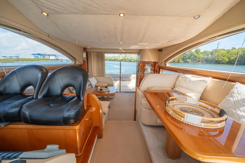 Slide: The Image of Luxurious interior of 2009 Princess F54 yacht with elegant seating and scenic water view. - 73