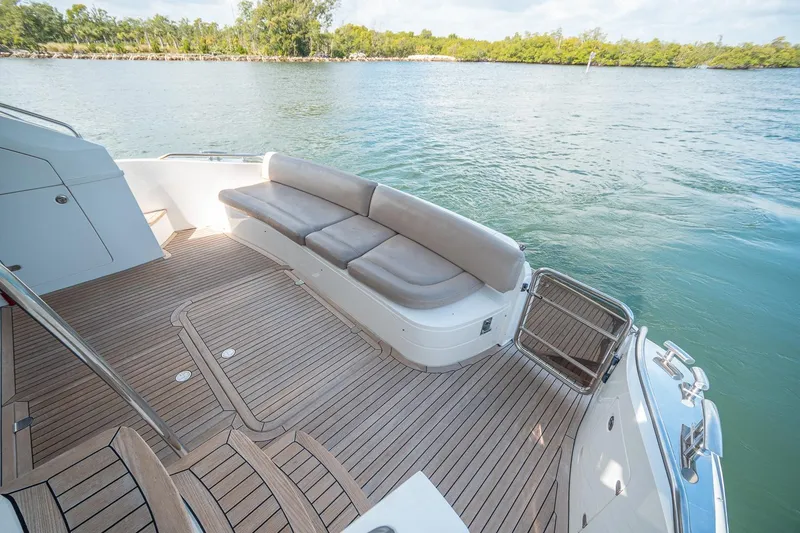 Slide: The Image of Luxury yacht Princess F54, 2009 model, with elegant teak deck and comfortable seating. - 94