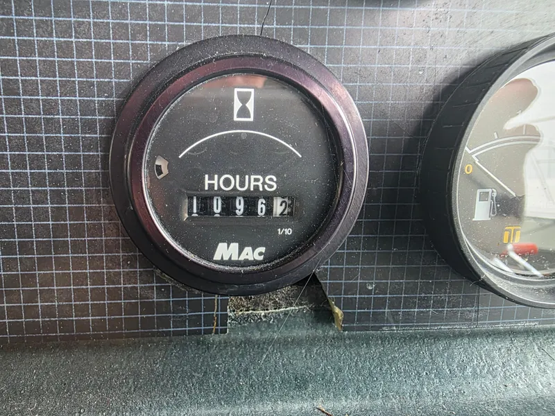 Slide: The Image of Hour meter showing 1096.2 hours on 1987 Sea Ray 390 Express Cruiser dashboard. - 5