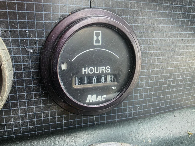 Slide: The Image of Hour meter reading 1109.6 on 1987 Sea Ray 390 Express Cruiser dashboard. - 6
