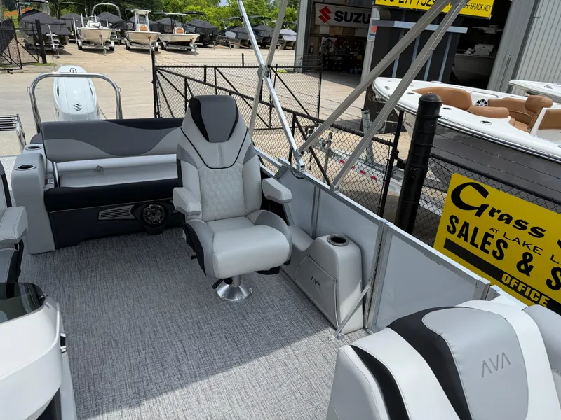 Slide: The Image of 2025 Avalon LSZ Versatile Rear Bench pontoon boat interior with luxurious seating and modern design. - 11