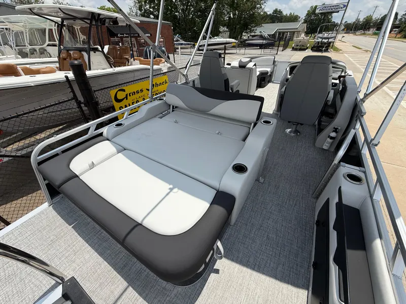Slide: The Image of 2025 Avalon LSZ Versatile Rear Bench pontoon boat with spacious seating and modern design. - 21