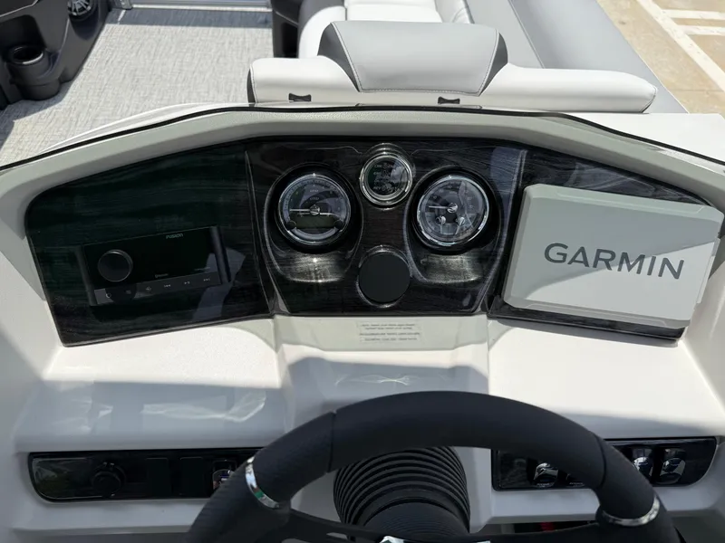 Slide: The Image of 2025 Avalon LSZ Versatile Rear Bench dashboard with Garmin navigation system. - 29