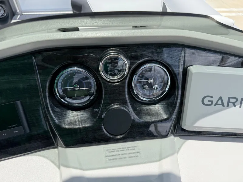 Slide: The Image of Dashboard of 2025 Avalon LSZ Versatile Rear Bench with gauges and Garmin display. - 31