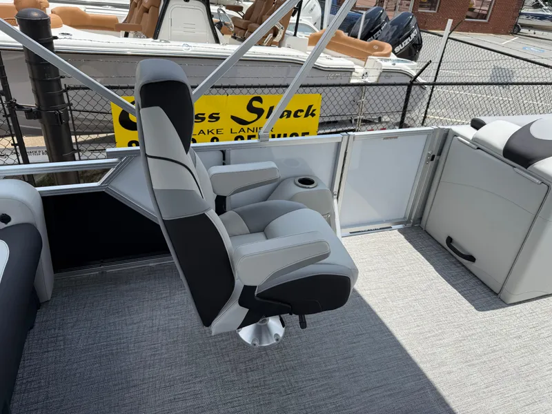 Slide: The Image of 2025 Avalon LSZ Versatile Rear Bench boat interior with plush seating and modern design. - 34